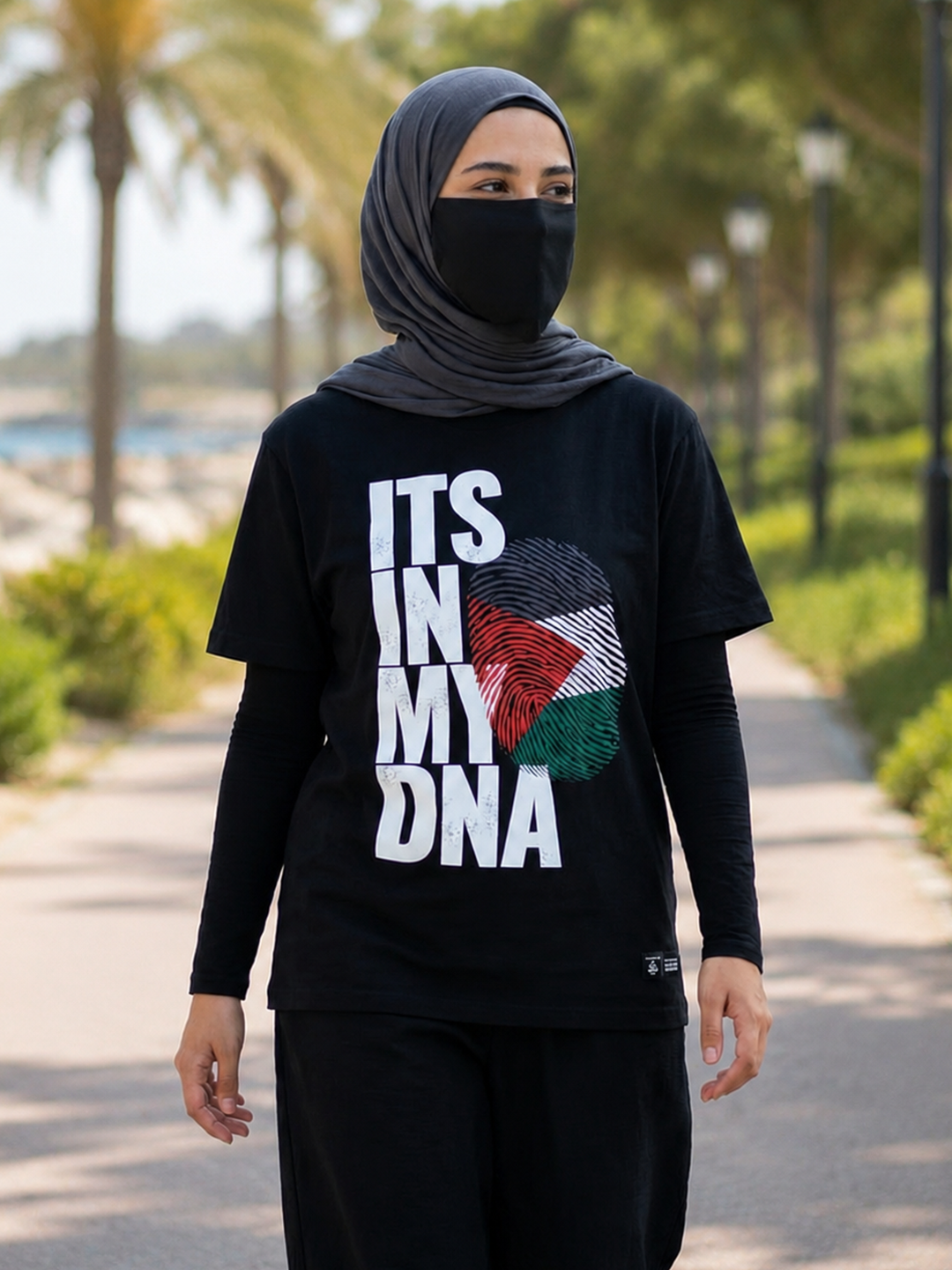 Women Palestine Double-Sided T-Shirt with "It’s In My DNA" for Solidarity